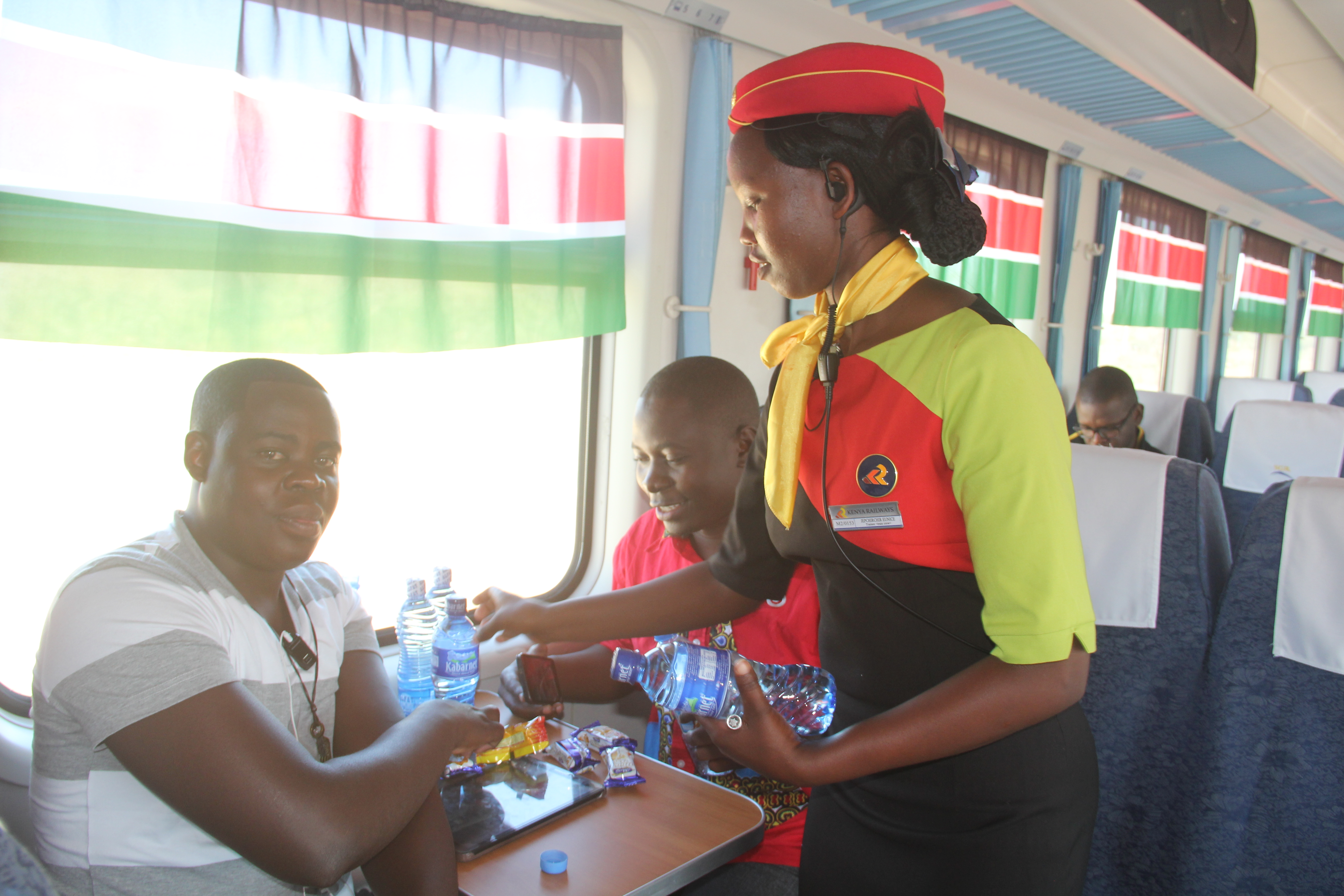 Passengers enjoying a meal on board the Madara Express.